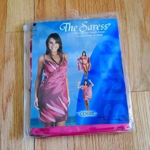 Saress Ultimate Beach Dress in the 'Cerise' color. simple wrap, Medium